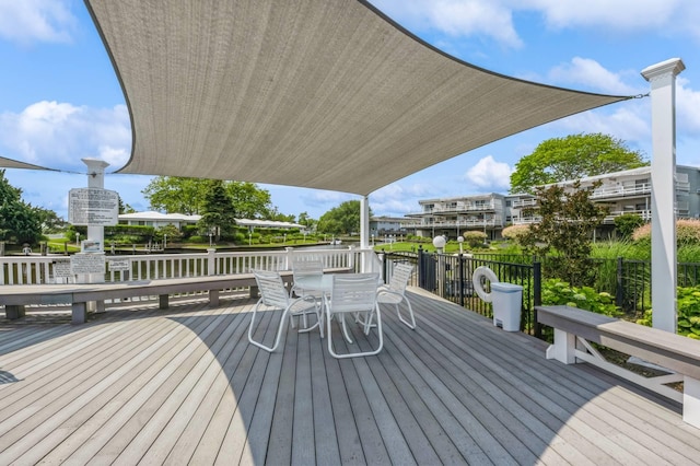 35 Library Ave Unit 8X, Westhampton Beach, NY 11978 - wooden terrace featuring outdoor dining space