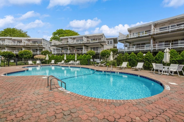 35 Library Ave Unit 8X, Westhampton Beach, NY 11978 - community pool with a patio area