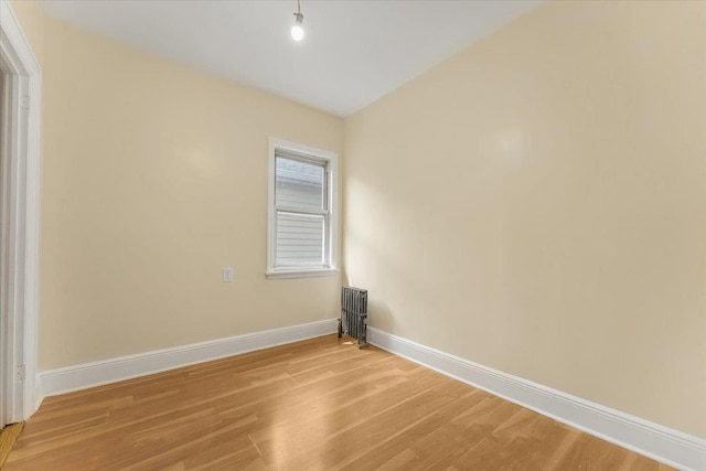 4216 Wickham Ave, Bronx, NY 10466 - unfurnished room with light wood-style floors and baseboards