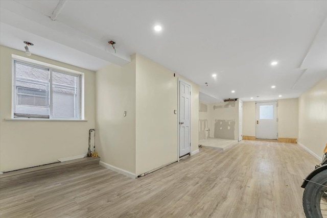 4216 Wickham Ave, Bronx, NY 10466 - unfurnished living room with light wood-style flooring and recessed lighting