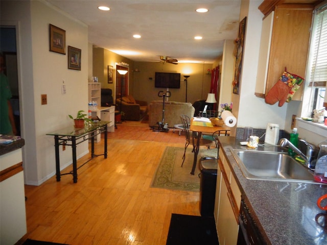 113 Camille Ln, East Patchogue, NY 11772 - kitchen featuring ceiling fan, light wood-style floors, recessed lighting, dark countertops, and open floor plan
