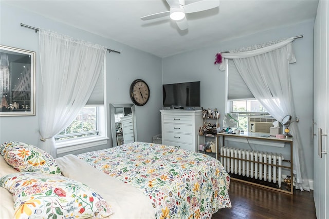 30-47 Hobart St Unit 6, Woodside, NY 11377 - bedroom with radiator heating unit, wood finished floors, a ceiling fan, and cooling unit