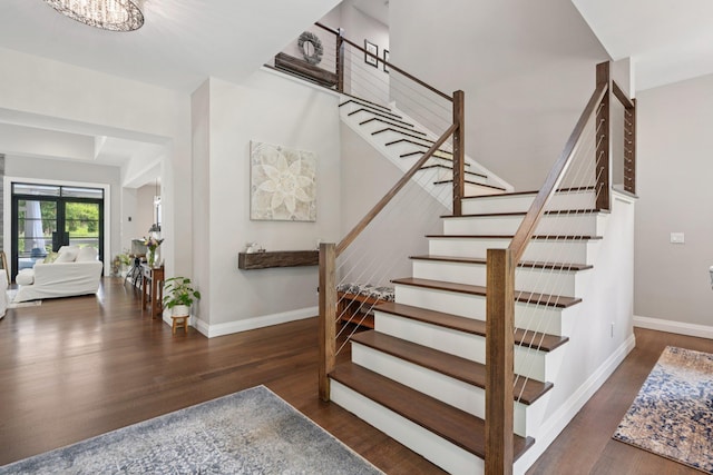 317 Old Mill Rd, Nissequogue, NY 11780 - stairs with wood finished floors and baseboards