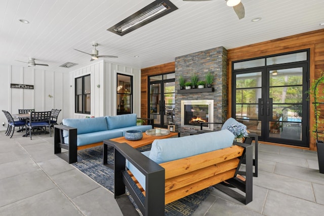317 Old Mill Rd, Nissequogue, NY 11780 - view of patio / terrace featuring a ceiling fan, french doors, an outdoor living space with a fireplace, and outdoor dining area