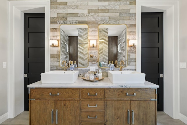 317 Old Mill Rd, Nissequogue, NY 11780 - bathroom featuring baseboards and double vanity