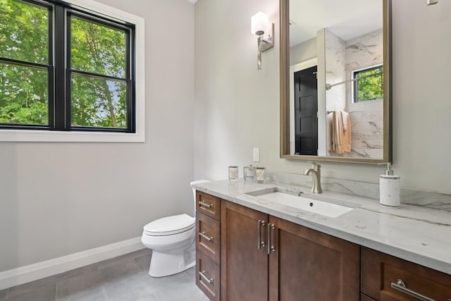 317 Old Mill Rd, Nissequogue, NY 11780 - full bath featuring plenty of natural light, vanity, a marble finish shower, and tile patterned flooring