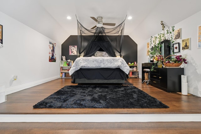 317 Old Mill Rd, Nissequogue, NY 11780 - bedroom with wood finished floors, vaulted ceiling, and recessed lighting