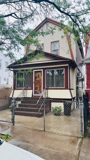 89-09 86th St, Woodhaven, NY 11421 - view of front of home with a gate and a fenced front yard
