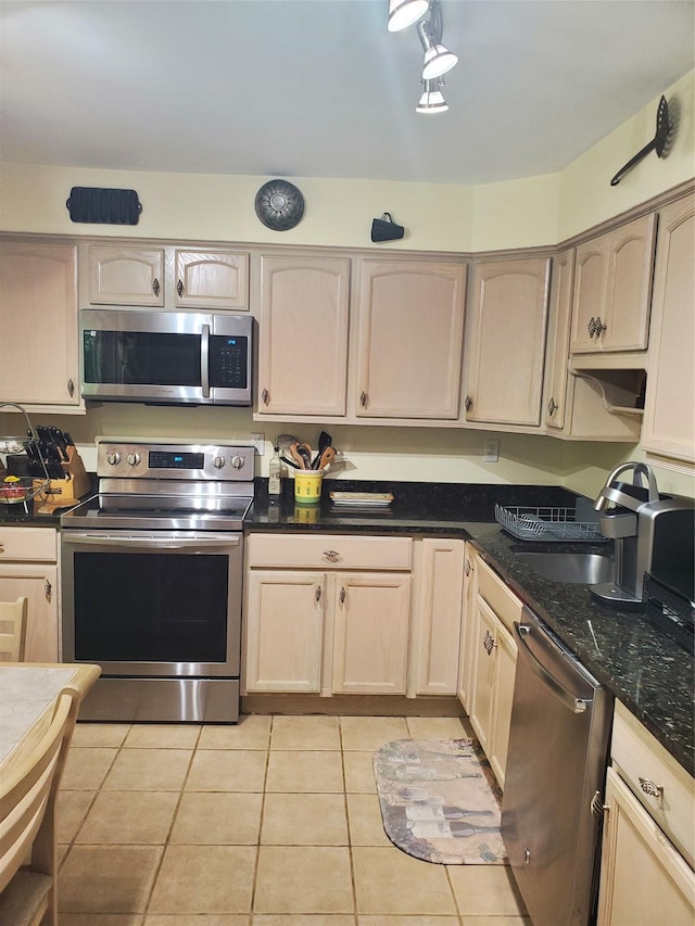 1106 Parkview Dr, Southfields, NY 10975 - kitchen with stainless steel appliances and light tile patterned floors