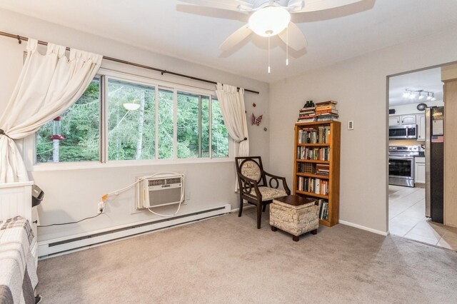 1106 Parkview Dr, Southfields, NY 10975 - sitting room with a baseboard heating unit, light carpet, a wall unit AC, and a ceiling fan