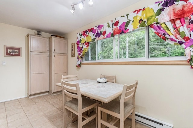 1106 Parkview Dr, Southfields, NY 10975 - dining room featuring a baseboard radiator, healthy amount of natural light, and light tile patterned flooring
