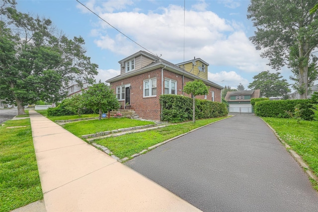 129 Guenther Ave, Valley Stream, NY 11580 - view of side of property featuring brick siding and a yard