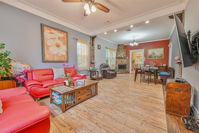 129 Guenther Ave, Valley Stream, NY 11580 - living area featuring light wood-type flooring, recessed lighting, ceiling fan, crown molding, and a stone fireplace