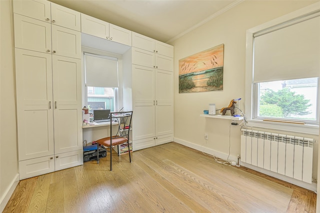 129 Guenther Ave, Valley Stream, NY 11580 - office area with radiator heating unit, light wood-type flooring, and crown molding