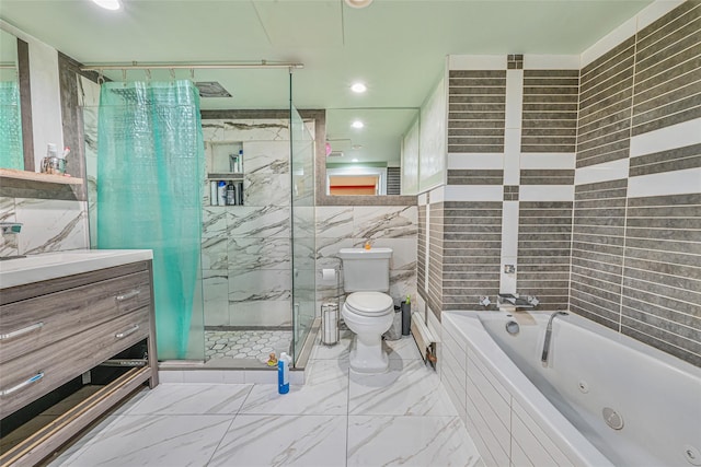 129 Guenther Ave, Valley Stream, NY 11580 - bathroom featuring tile walls, a jetted tub, a marble finish shower, vanity, and marble look tiles