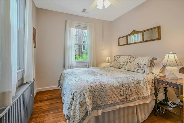 56 Locust Dr, Rocky Point, NY 11778 - bedroom featuring wood finished floors and ceiling fan