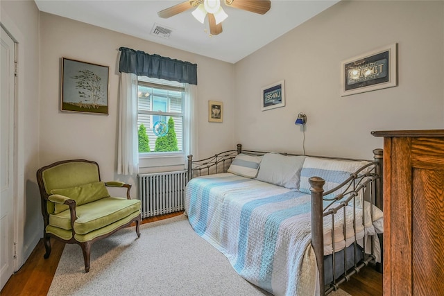 56 Locust Dr, Rocky Point, NY 11778 - bedroom with wood finished floors and ceiling fan