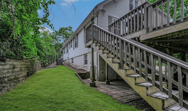 56 Locust Dr, Rocky Point, NY 11778 - view of side of property with stairway, a yard, and a deck