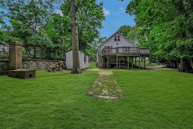 56 Locust Dr, Rocky Point, NY 11778 - view of grassy yard featuring a storage unit, a deck, and stairs