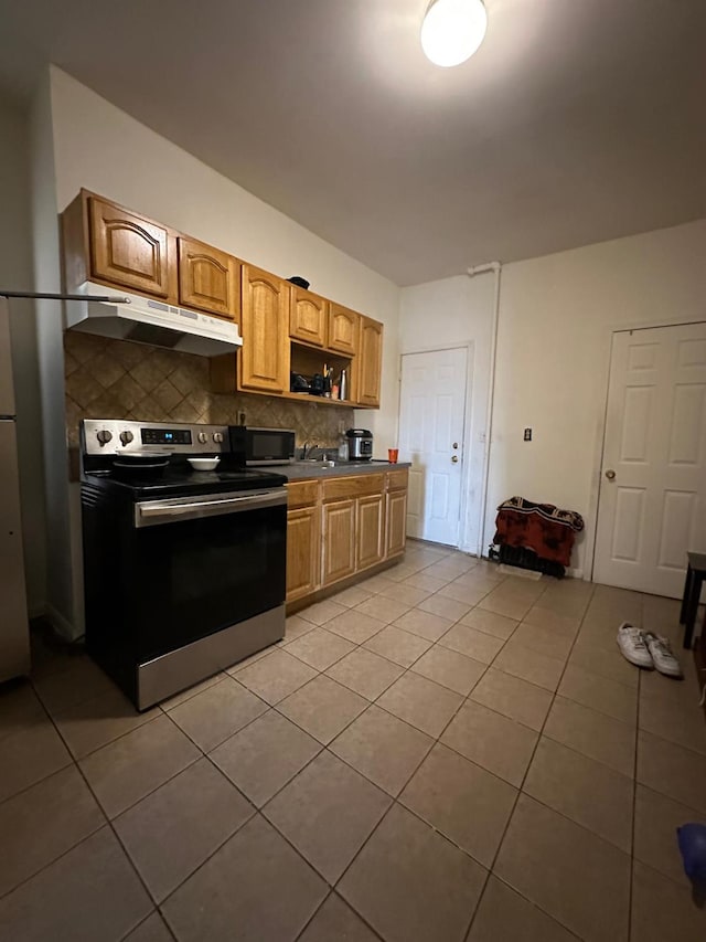 110 Beech St, Yonkers, NY 10701 - kitchen featuring electric stove, under cabinet range hood, light tile patterned floors, decorative backsplash, and open shelves