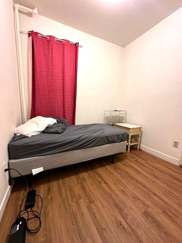 110 Beech St, Yonkers, NY 10701 - bedroom featuring wood finished floors and baseboards