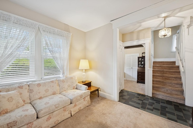 45 Crosby Ave, Albertson, NY 11507 - carpeted living room with plenty of natural light, a chandelier, and stairs