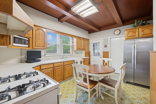 45 Crosby Ave, Albertson, NY 11507 - kitchen featuring white appliances, beamed ceiling, light countertops, and custom exhaust hood