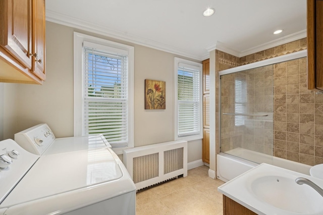 45 Crosby Ave, Albertson, NY 11507 - laundry area with radiator, separate washer and dryer, crown molding, plenty of natural light, and light tile patterned floors