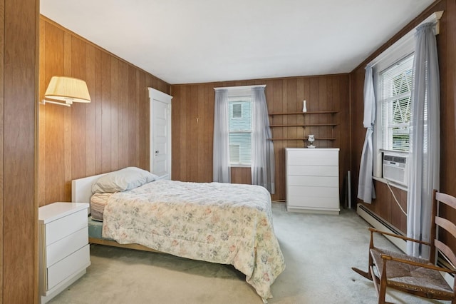 45 Crosby Ave, Albertson, NY 11507 - bedroom with light colored carpet, cooling unit, and wooden walls
