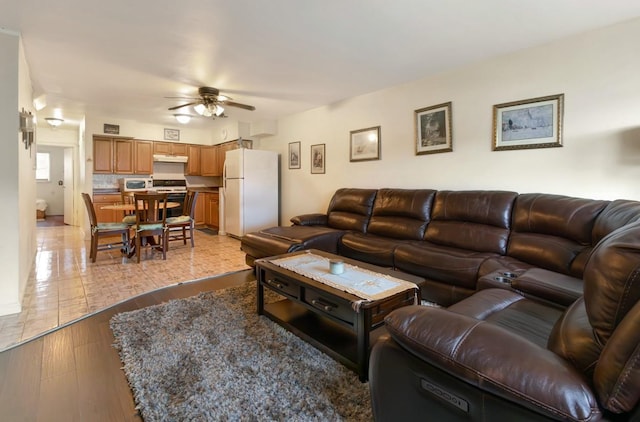 200-06 39th Ave, Bayside, NY 11361 - living room with ceiling fan and light wood-style flooring