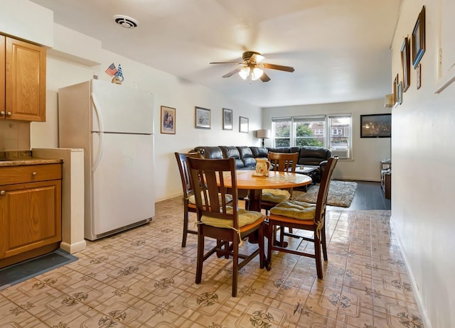 200-06 39th Ave, Bayside, NY 11361 - dining room with a ceiling fan and baseboards