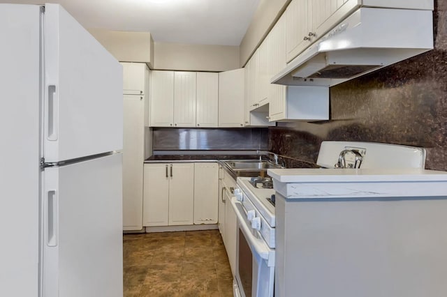 200-06 39th Ave, Bayside, NY 11361 - kitchen featuring white appliances, under cabinet range hood, white cabinetry, dark countertops, and tasteful backsplash