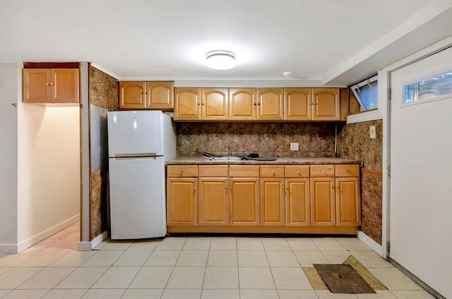 200-06 39th Ave, Bayside, NY 11361 - kitchen featuring freestanding refrigerator, brown cabinets, light tile patterned floors, and tasteful backsplash