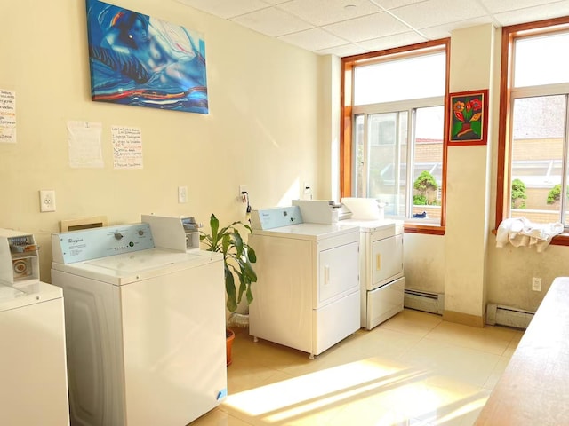 40-48 97th St Unit 1B, Corona, NY 11368 - shared laundry featuring separate washer and dryer and a baseboard radiator