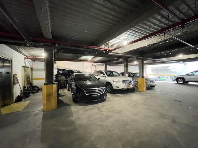 40-48 97th St Unit 1B, Corona, NY 11368 - parking garage featuring concrete block wall