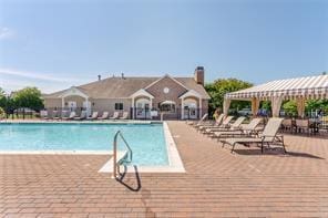 164 Ira Rd, Mount Sinai, NY 11766 - community pool with a patio area