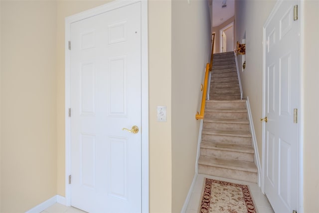164 Ira Rd, Mount Sinai, NY 11766 - stairway featuring tile patterned floors