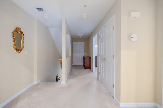 164 Ira Rd, Mount Sinai, NY 11766 - hall featuring an upstairs landing and light carpet
