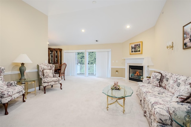 164 Ira Rd, Mount Sinai, NY 11766 - carpeted living area with lofted ceiling, a fireplace with flush hearth, and recessed lighting
