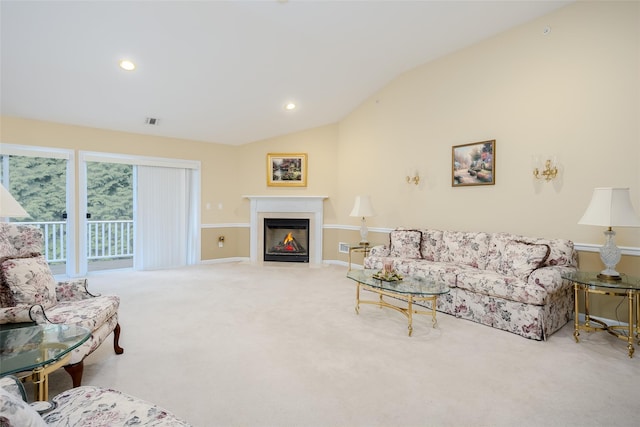 164 Ira Rd, Mount Sinai, NY 11766 - carpeted living room featuring lofted ceiling, a fireplace with flush hearth, and recessed lighting