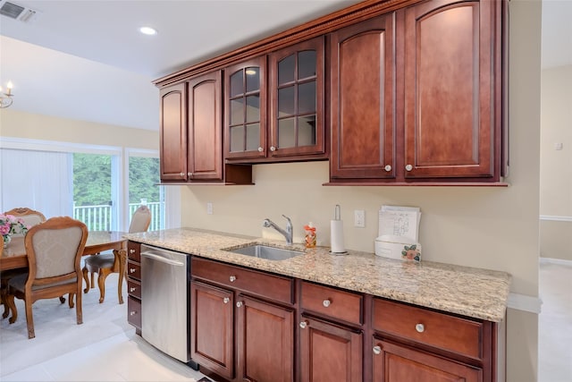 164 Ira Rd, Mount Sinai, NY 11766 - kitchen with stainless steel dishwasher, light stone counters, glass insert cabinets, and recessed lighting