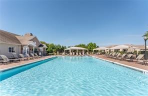 164 Ira Rd, Mount Sinai, NY 11766 - community pool with a patio area