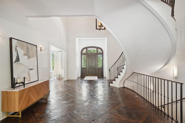 3 Terrace Cir, Armonk, NY 10504 - entryway featuring a towering ceiling and stairway
