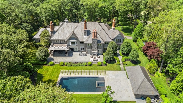 3 Terrace Cir, Armonk, NY 10504 - aerial view of property and surrounding area featuring a pool and a heavily wooded area