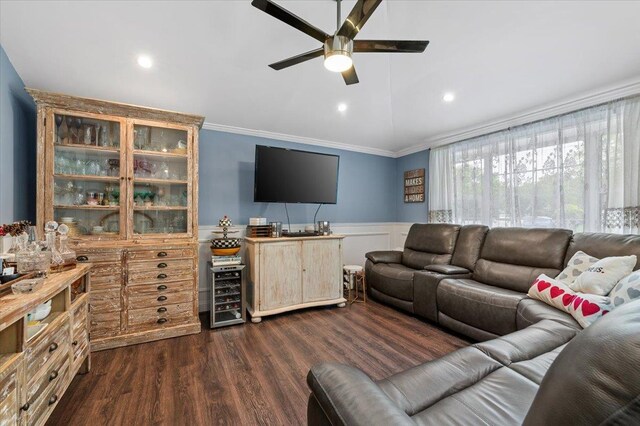 7 Pine Tree Dr, Shirley, NY 11967 - living room featuring ceiling fan, ornamental molding, a wainscoted wall, dark wood-style flooring, and beverage cooler