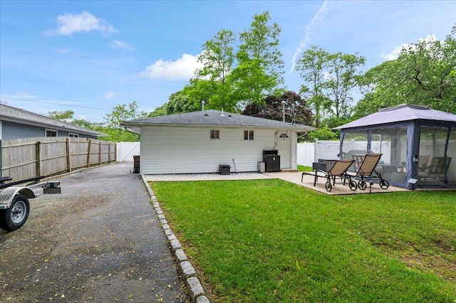 7 Pine Tree Dr, Shirley, NY 11967 - rear view of house with a patio area and a gazebo