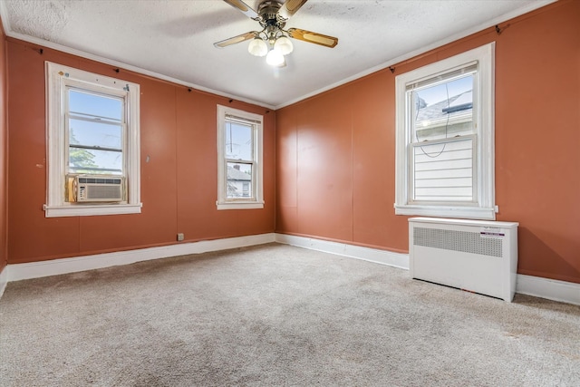 342 E 55th St, Brooklyn, NY 11203 - carpeted empty room featuring radiator heating unit, crown molding, ceiling fan, a textured ceiling, and cooling unit