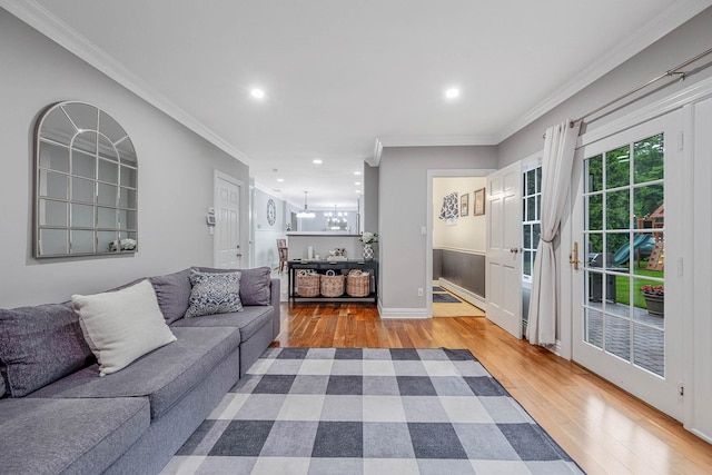 15 Format Ln, Smithtown, NY 11787 - living room featuring wood finished floors, crown molding, and recessed lighting