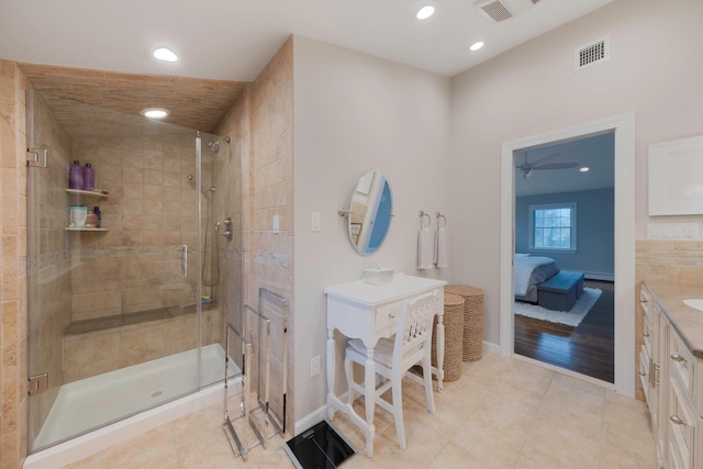 15 Format Ln, Smithtown, NY 11787 - bathroom featuring vanity, a stall shower, tile patterned flooring, a ceiling fan, and recessed lighting