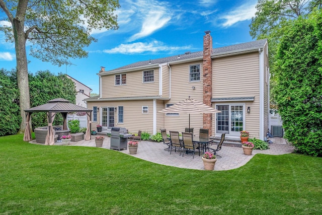 15 Format Ln, Smithtown, NY 11787 - rear view of property with a gazebo, a patio, a chimney, and an outdoor hangout area
